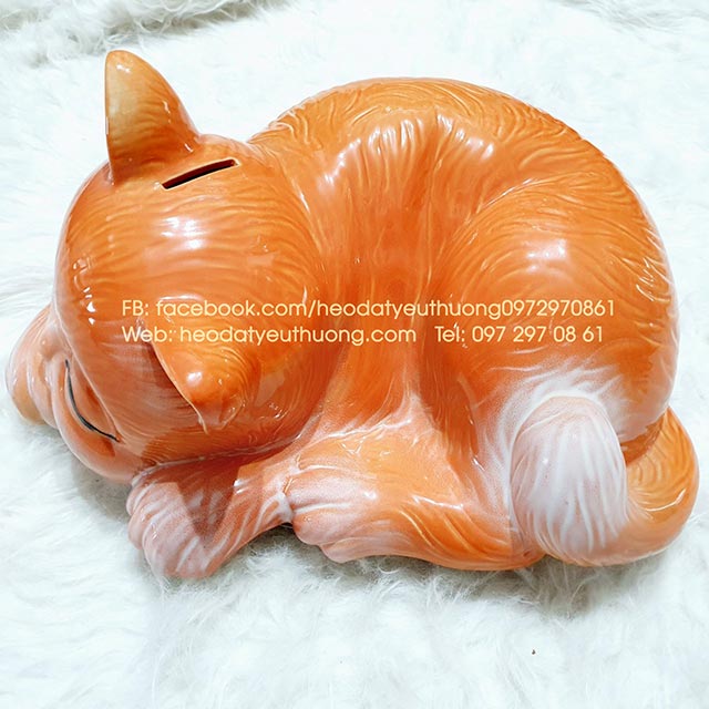 M&egrave;o tiết kiệm d&aacute;ng nằm m&agrave;u cam 1