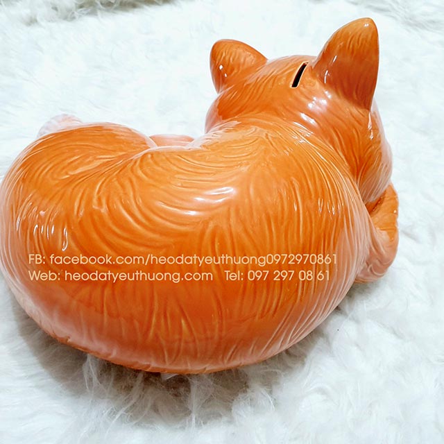 M&egrave;o tiết kiệm d&aacute;ng nằm m&agrave;u cam