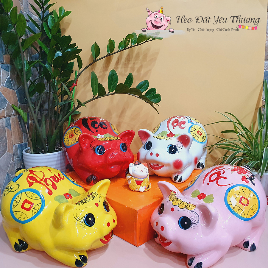Heo đất gánh tiền gốm sứ - ống heo tiết kiệm